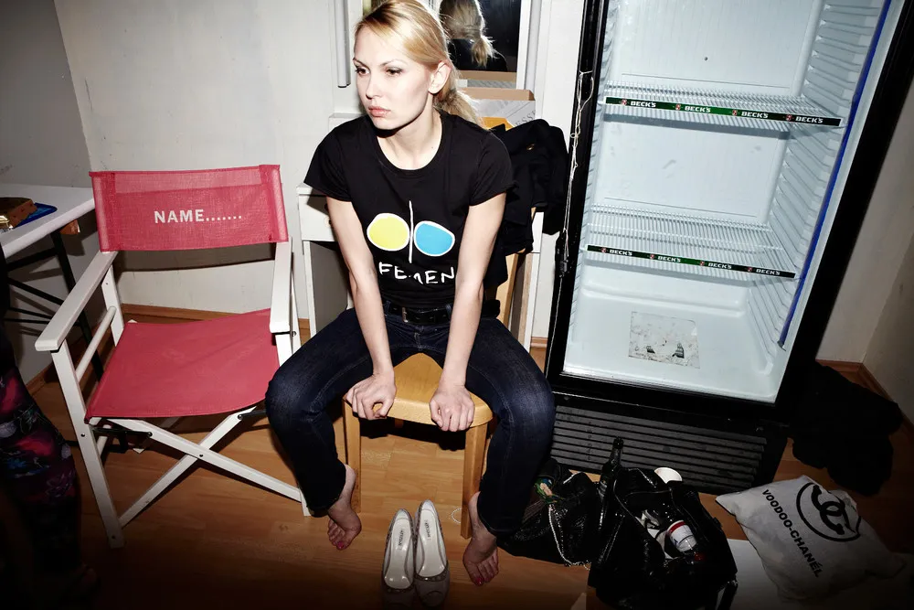 Topless FEMEN Protester Attacks Russian Patriarch