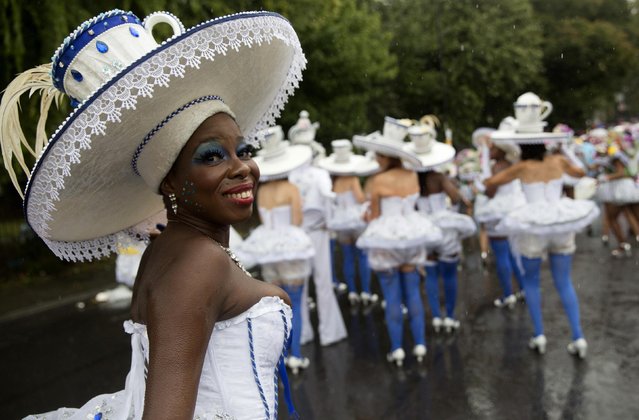 Performers take part in the Notting Hill Carnival in west London August 25, 2014. (Photo by Neil Hall/Reuters)