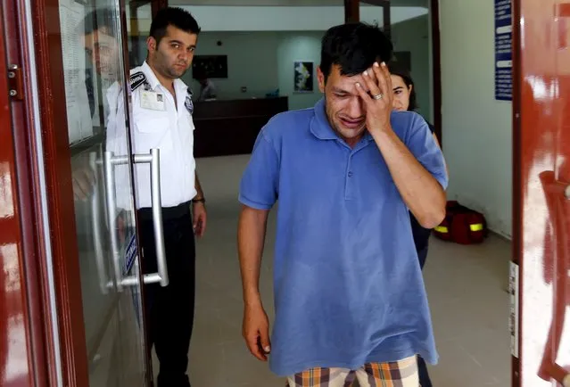 Abdullah Kurdi, father of three-year old Aylan Kurdi, cries as he leaves a morgue in Mugla, Turkey, September 3, 2015. The family of Aylan, a Syrian toddler whose body washed up on a Turkish beach, had been trying to emigrate to Canada after fleeing the war-torn town of Kobani, one of their relatives told a Canadian newspaper on Thursday. (Photo by Murad Sezer/Reuters)