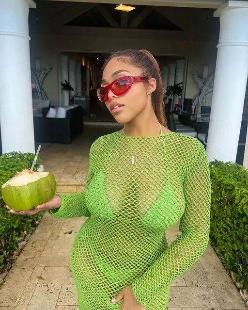 American socialite and model Jordyn Woods in the last decade of August 2022 is a vision in green to complement her watermelon drink. (Photo by jordynwoods/Instagram)