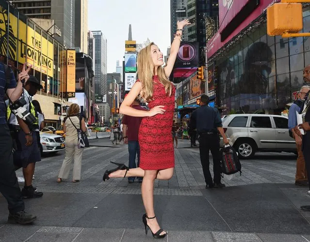 Reigning Miss America 2015 Kira Kazantsev poses in Times Square as Miss America takes over New York City on the road to the 95th Anniversary Of The Miss America Competition on September 1, 2015 in New York City. (Photo by Michael Loccisano/Getty Images for Miss America)