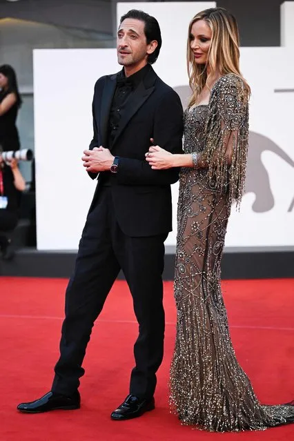 US actor Adrien Brody and British stylist Georgina Chapman arrive on September 8, 2022 for the screening of the film “Blonde” presented in the Venezia 79 competition as part of the 79th Venice International Film Festival at Lido di Venezia in Venice, Italy. (Photo by Tiziana Fabi/AFP Photo)