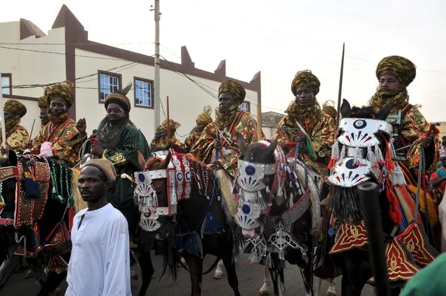Horsemen take part in a parade during the second day of durbar, attended by Emir of Kano, Muhammad Sanusi II, after the emir's return from Hajj, in Kano October 18, 2015. (Photo by Reuters/Stringer)