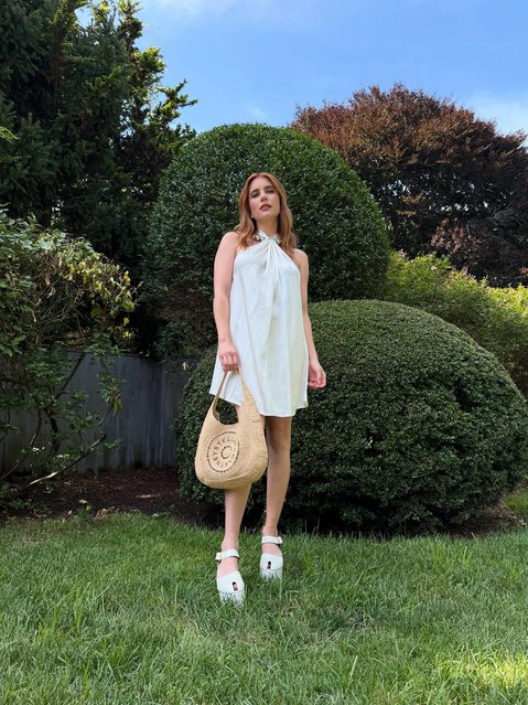 American actress and singer Emma Roberts keeps cool in a flowy mini dress on July 15, 2025. (Photo by emmaroberts/Instagram)