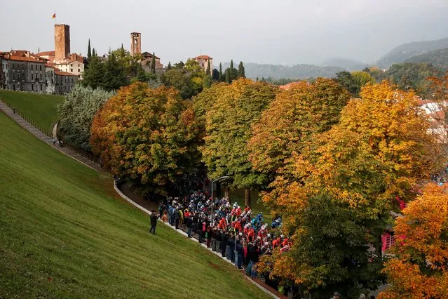 The pack rides during the 17th stage of the Giro d'Italia 2020 cycling race, a 203-kilometer route between Bassano del Grappa – Madonna di Campiglio, on October 21, 2020. (Photo by Luca Bettini/AFP Photo)