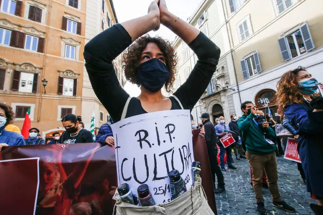 Workers of the entertainment sector, hard hit by the Italian government's Covid-19-linked restrictions, demonstrate in Rome, Italy, 30 October 2020. Italian Prime Minister Giuseppe Conte tightened nationwide coronavirus restrictions after the country registered a record number of new cases, despite opposition from regional heads and street protests over curfews. (Photo by Fabio Frustaci/EPA/EFE)