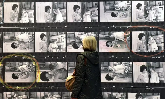 Visitor views images by American photographer, reporter and artist Eve Arnold, part of the “Eve Arnold, The Work” exhibition at Camera on March 20, 2023 in Turin, Italy. (Photo by Roberto Serra – Iguana Press/Getty Images)