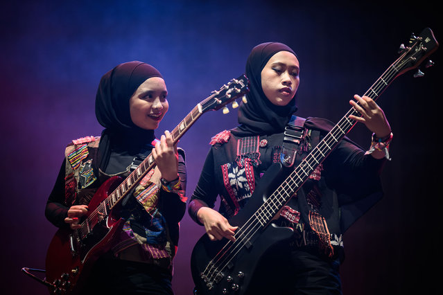 Guitarist Firda “Marsya” Kurnia (L) and bassist Widi Rahmawati of Indonesian heavy metal band “Voice of Baceprot” perform onstage during day three of Glastonbury Festival 2024 at Worthy Farm, Pilton on June 28, 2024 in Glastonbury, England. Founded by Michael Eavis in 1970, Glastonbury Festival features around 3,000 performances across over 80 stages. Renowned for its vibrant atmosphere and iconic Pyramid Stage, the festival offers a diverse lineup of music and arts, embodying a spirit of community, creativity, and environmental consciousness. (Photo by Leon Neal/Getty Images)