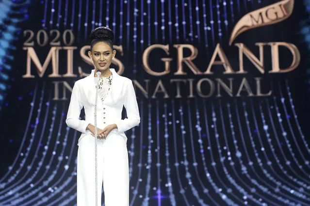 In this photo provided by Miss Grand International, Miss Myanmar, Han Lay, speaks on stage during Miss Grand International contest Saturday, March 27, 2021, in Bangkok, Thailand. The beauty pageant contestant from Myanmar used her brief moment in the spotlight on Saturday night to appeal for international help for her country, on the worst day for bloodshed since the military there staged its coup almost two months ago. (Photo by Miss Grand International via AP Photo)