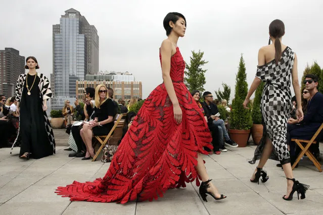 Models walk in the finale of the Oscar de la Renta spring 2019 collection during Fashion Week in New York, Tuesday, September 11, 2018. (Photo by Richard Drew/AP Photo)