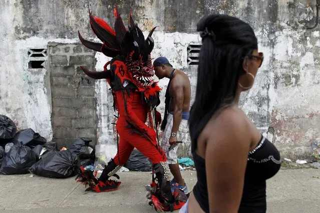 A man, dressed up as the devil, performs during the “Diablos y Congos” (Devils and the Africans) festival in Nombre de Dios, Colon Province, February 18, 2015. (Photo by Carlos Jasso/Reuters)