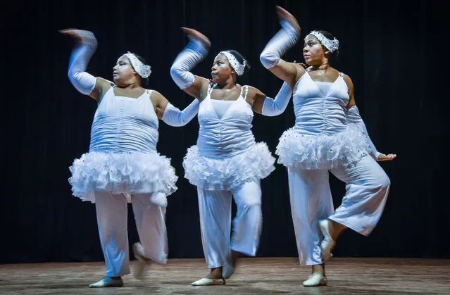 Members of the Danza Voluminosa (Voluminous Dance) Cuban dance group rehearse at the National Theatre in Havana, on January 13, 2016. (Photo by Adalberto Roque/AFP Photo)