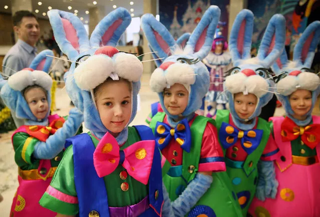 Kids attend a Christmas show at the State Kremlin Palace in Moscow, Russia on December 28, 2016. (Photo by Artyom Geodakyan\TASS via Getty Images)