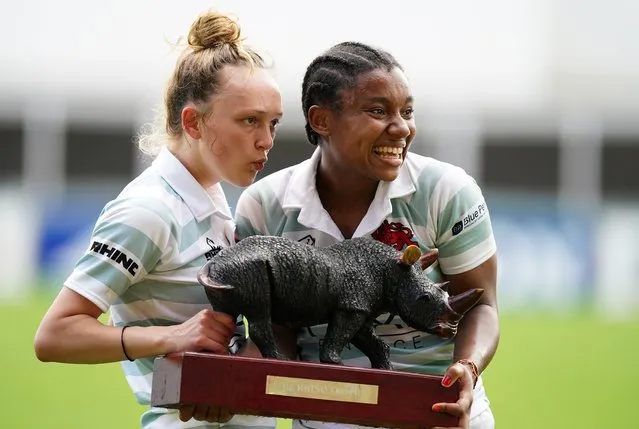 Cambridge's Emily Bell (right) with team-mate Emma Jones and The Rhino Trophy after the women's varsity match at Mattioli Woods Welford Road Stadium, Leicester on Sunday, July 4, 2021. (Photo by Mike Egerton/PA Images via Getty Images)