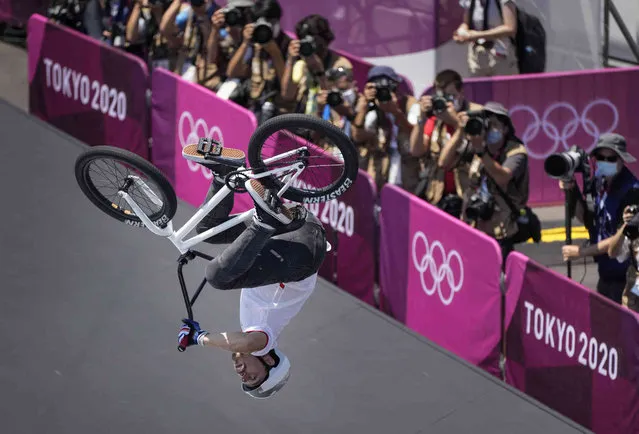 Kenneth Fabian Tencio Esquivel of Costa Rica makes a jump in the men's BMX freestyle finals at the 2020 Summer Olympics, Sunday, August 1, 2021, in Tokyo, Japan. (Photo by Ben Curtis/AP Photo)