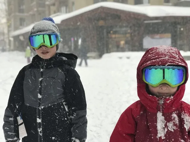 This photo provided by Michael Patrick O’Neill shows his sons Liam, left, and Finn in the snow at Squaw Valley, Lake Tahoe, Calif., on Sunday, January 6, 2019. A winter storm swept through parts of California, Nevada and Utah, bringing heavy snow to some communities. (Photo by Michael Patrick O’Neill via AP Photo)