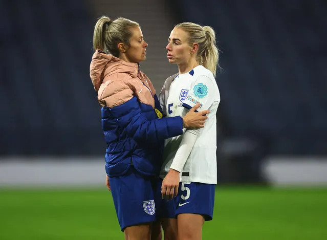 England's Alex Greenwood (right) hugs team-mate Rachel Daly at the end of the UEFA Women's Nations League Group A1 match at Hampden Park, Glasgow, after failing to advance to the Nations League finals and secure Paris 2024 Olympic qualification following the result of the Nations League match between the Netherlands and Belgium on Tuesday, December 5, 2023. (Photo by Carl Recine/Reuters)