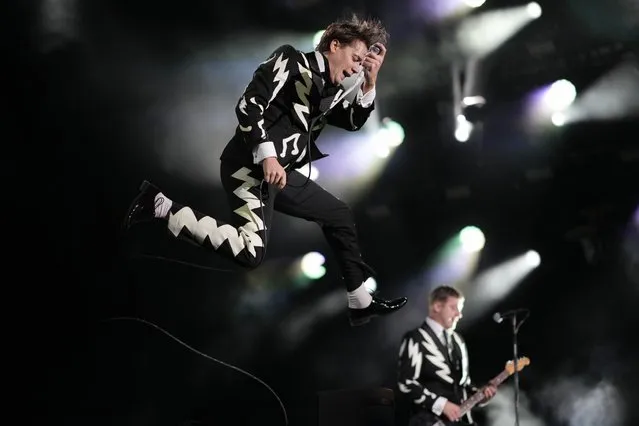 Singer Pelle Almqvist of the Swedish rock band The Hives performs during the Corona Capital music festival in Mexico City, Friday, November 17, 2023. (Photo by Eduardo Verdugo/AP Photo)