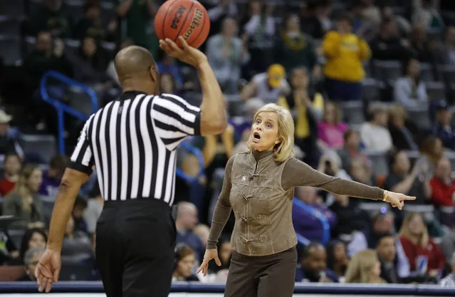Baylor head coach Kim Mulkey talks to an official during a time out against Texas Tech in the first half of an NCAA college basketball game in the Big 12 women's conference tournament in Oklahoma City, Saturday, March 9, 2019. (Photo by Alonzo Adams/AP Photo)