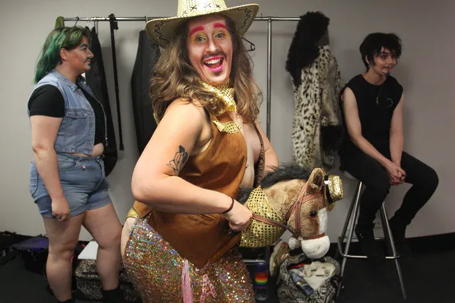 Drag performers prepare backstage during the inaugural “King of Kings” competition presented by “Heaps Gay and Sydny Kings” at Max Watts on February 27, 2021 in Sydney, Australia. Show producer and Non-Binary Drag performer Gabriel Angel Gabriel , 24, began performing drag in 2018, singing, acting and producing a wide variety of material for audiences in Australia since. Drag Kings have seen a resurgence in recent times, attracting sold out shows and Gabriel credits the creative process as getting them through difficult personal times as well as further broadening the discussion surrounding gender. This month sees the celebration of Sydney Mardi Gras culminating in a parade which began in 1978 as a march and commemoration of the 1969 Stonewall Riots of New York. It is an annual event promoting awareness of gay, lesbian, bisexual and transgender issues and themes. (Photo by Lisa Maree Williams/Getty Images)