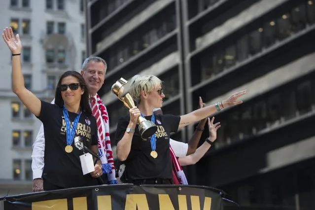 The U.S. women's soccer team cheer during the ticker tape parade to celebrate their World Cup final win over Japan on Sunday, in New York, July 10, 2015. (Photo by Andrew Kelly/Reuters)