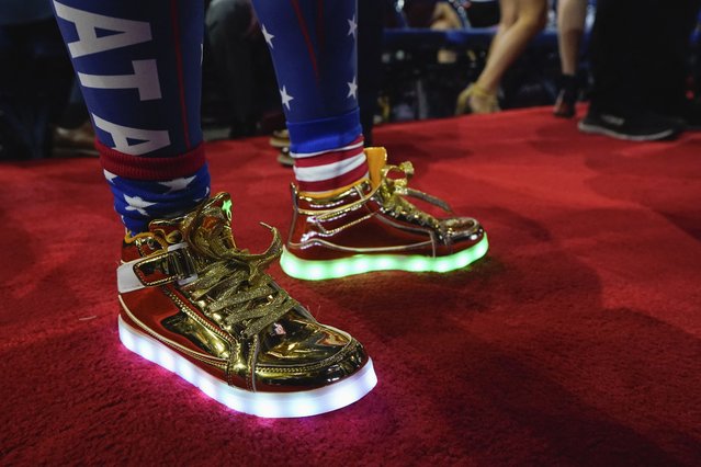 An attendee wears an illuminated pair of shoes on Day 1 of the RNC in Milwaukee on July 15, 2024. (Photo by Elizabeth Frantz/Reuters)