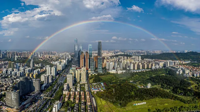 At about 16:00 pm on May 16, 2021, a beautiful rainbow hung over the ASEAN business district after heavy rain in Nanning, Guangxi. (Photo by Sipa Asia/Rex Features/Shutterstock)