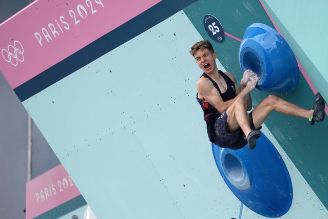 Toby Roberts of Great Britain competes in the men's boulder and lead, boulder final, during the sport climbing competition at the 2024 Summer Olympics, Friday, August 9, 2024, in Le Bourget, France. (Photo by Tsvangirayi Mukwazhi/AP Photo)