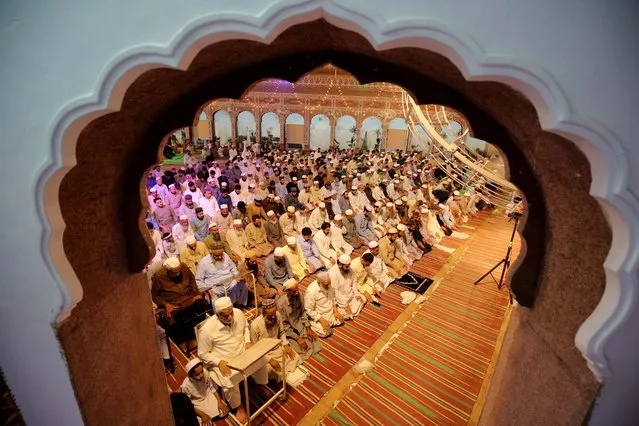 A general view of an illuminated Mosque as Muslims offer special Taravih prayers at a Mosque, during the 27th night of Ramadan, the holy month of fasting, in Peshawar, Pakistan, 28 April 2022. (Photo by Bilawal Arbab/EPA/EFE)