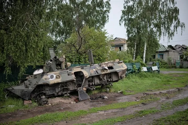 An abandoned and looted Russian APC is seen on the street on May 31, 2022 in Ivanivka, Ukraine. (Photo by Alexey Furman/Getty Images)