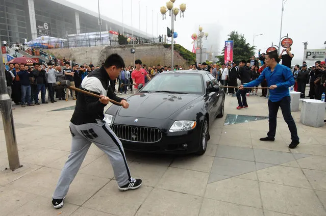 Man Smashes His Maserati In Protest In China