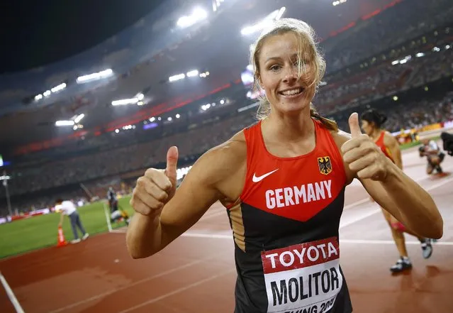 Kathrina Molitor of Germany celebrates after winning gold in the women's javelin throw final during the 15th IAAF World Championships at the National Stadium in Beijing, China August 30, 2015. (Photo by Kai Pfaffenbach/Reuters)