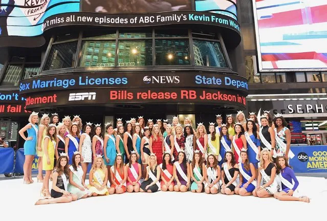 All 52 contestants from the 2016 Miss America Competition pose in Times Square as Miss America takes over New York City on the road to the 95th Anniversary Of The Miss America Competition on September 1, 2015 in New York City. (Photo by Michael Loccisano/Getty Images for Miss America)