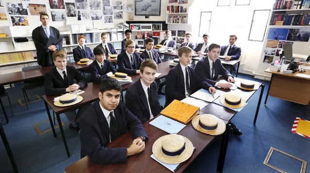 Students in Dr. Hugh McCormick's lower sixth politics division (year 12) sit in their classroom in Old Schools on the last day of term at Harrow School in Middlesex, Britain, June 16, 2015. Noteable Old Harrovians include Winston Churchill, King Hussein of Jordan, Lord Byron and Benedict Cumberbatch. (Photo by Suzanne Plunkett/Reuters)