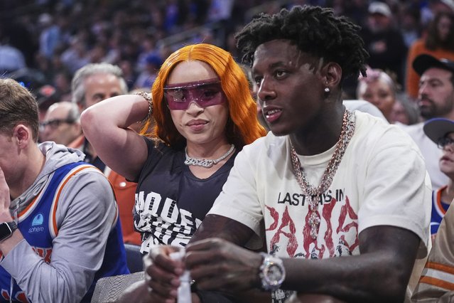 Ice Spice, left, and New York Jets' Sauce Gardner watch during the first half of Game 6 in the Eastern Conference semifinals of the NBA basketball playoffs between the New York Knicks and the Boston Celtics Friday, May 16, 2025, in New York. (Photo by Frank Franklin II/AP Photo)