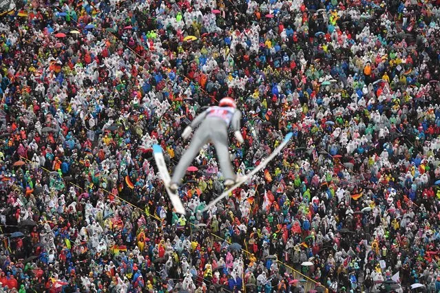 Constantin Schmid of Germany jumps during the ski jumping event of the third stage at the 66th Four Hills Tournament in Innsbruck, Austria on January 4, 2018. (Photo by Joe Klamar/AFP Photo)