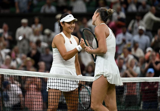 Emma Raducanu of Great Britain congratulates Aryna Sabalenka at the net following her victory in their Ladies' Singles third round match on day five of The Championships Wimbledon 2025 at All England Lawn Tennis and Croquet Club on July 04, 2025 in London, England. (Photo by Visionhaus/Getty Images)