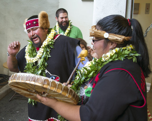 Tlingit Tribe members from Klawock, Alaska Jonathan Rowan, left, and Eva Rowan perform a dance at the Honolulu Museum of Arts, Thursday, October 22, 2015, in Honolulu. (Photo by Marco Garcia/AP Photo)