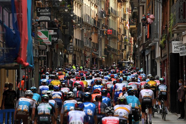Peloton / Estafeta Street / Pamplona City / Balconies / Public / Fans / Landscape / during the 75th Tour of Spain 2020, Stage 2 a 151,6km stage from Pamplona to Lekunberri / @lavuelta / #LaVuelta20 / La Vuelta / on October 21, 2020 in Lekunberri, Spain. (Photo by David Ramos/Getty Images)