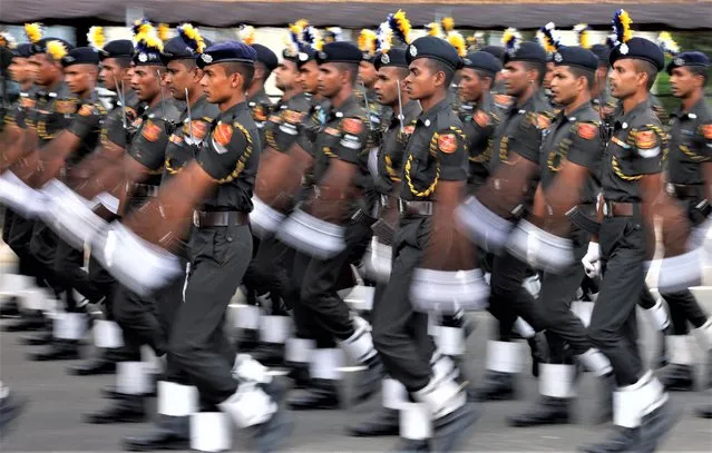 Members of the army take part in a military parade during a rehearsal ahead of Sri Lanka's 75th Independence Day celebrations in Colombo, Sri Lanka on February 2, 2023. (Photo by Dinuka Liyanawatte/Reuters)