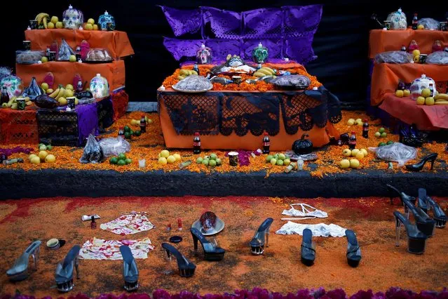 An altar is seen during a procession organized by s*x workers to remember their deceased colleagues, especially those who were violently murdered, as part of the celebrations ahead of the Day of the Dead, in Mexico City, Mexico October 28, 2016. (Photo by Ginnette Riquelme/Reuters)
