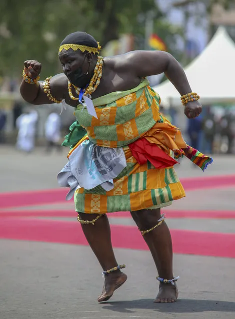 A traditional dancer from Ghana performs for President of Ghana Nana Akufo-Addo's official inauguration ceremony in Accra, Ghana, 07 January 2021. Nana Akufo-Addo was sworn in for a second term at the Parliament House in Accra. (Photo by Christian Thompson/EPA/EFE)