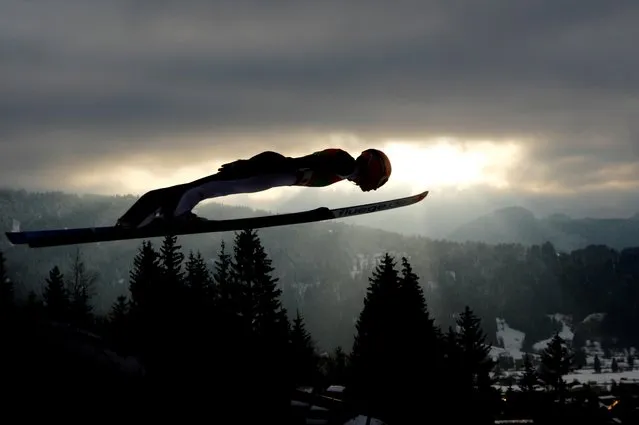 Czech Republic's Viktor Polasek in action during the men's team HS137 ski jumping at the FIS Nordic World Ski Championships in Oberstdorf, Germany on March 6, 2021. (Photo by Kai Pfaffenbach/Reuters)