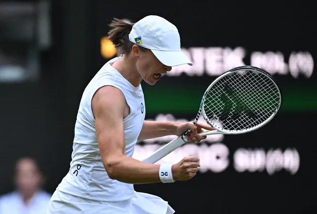 Iga Swiatek of Poland celebrates after her victory against Belinda Bucic of Switzerland during day seven of The Championships Wimbledon 2023 at All England Lawn Tennis and Croquet Club on July 9, 2023 in London, England. (Photo by Dylan Martinez/Reuters)