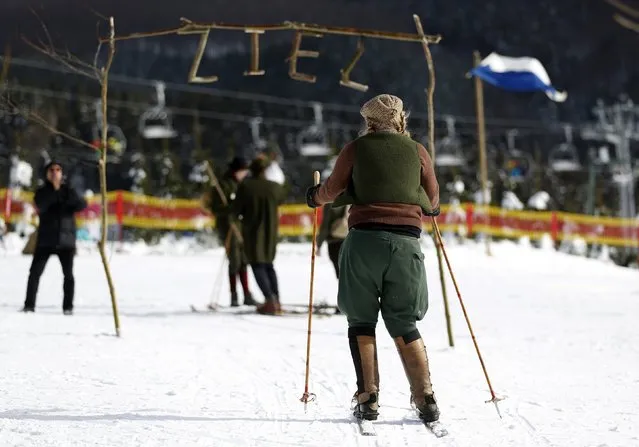 A participant competes in the “Nostalgic Ski Race” in the western town of Neuastenberg February 8, 2015. (Photo by Ina Fassbender/Reuters)