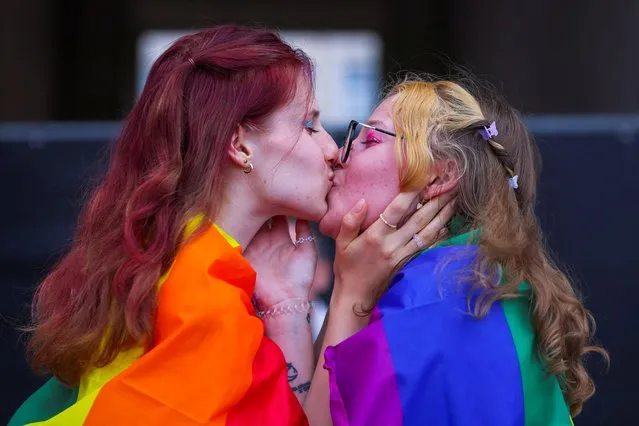 Participants kiss during the annual Belgian LGBT Pride Parade in central Brussels, Belgium, May 21, 2022. (Photo by Johanna Geron/Reuters)