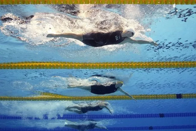 Katie Ledecky, top, of the United States, competes in a women's 1500-meter heat at the World Swimming Championships in Fukuoka, Japan, Monday, July 24, 2023. (Photo by David J. Phillip/AP Photo)