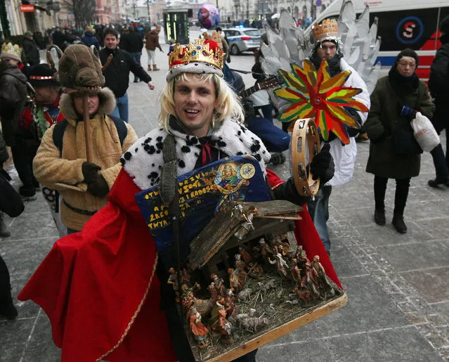 Citizens of Warsaw  participate  at the Epiphany parade   in Warsaw, Poland, Wednesday, January 6, 2016. The Epiphany day celebrates the visit of the Three Kings to the infant Jesus. (Photo by Czarek Sokolowski/AP Photo)