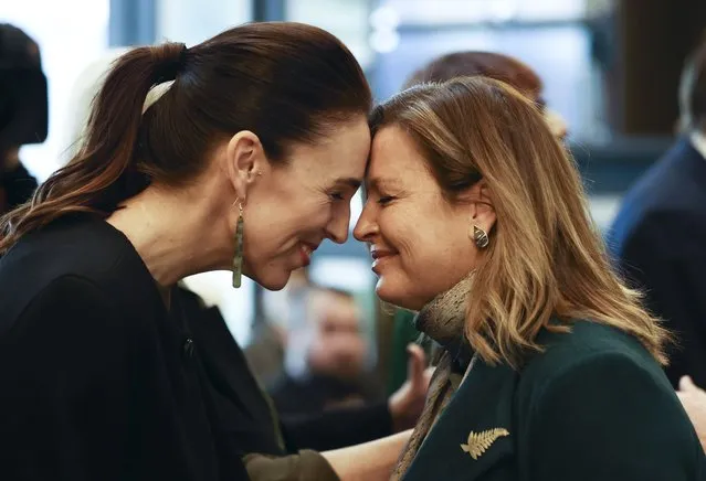 Jenny Morrison, right, wife of Australian Prime Minister Scott Morrison, receives a hongi from New Zealand Prime Minister Jacinda Ardern during a Powhiri (welcome ceremony) at a hotel in Queenstown, New Zealand, Sunday, May 30, 2021. Growing friction with China and how to reopen borders after the pandemic will likely be among the topics discussed by the leaders of Australia and New Zealand in their first face-to-face meeting since the coronavirus outbreak began. (Photo by George Heard/NZ Herald via AP Photo)