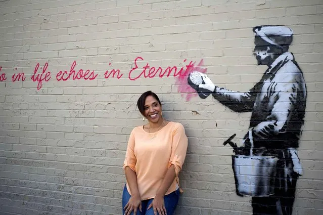 A Banksy mural is seen October 14 on a wall in Queens. The quote is from the movie “Gladiator”. It says, “What we do in life echoes in eternity”. (Photo by Frances M. Roberts/Newscom/SIPA Press)
